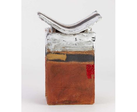 † ROBIN WELCH (born 1936-2019); a rectangular stoneware slab vessel with curved top and bands of red rust, black, ochre, whit