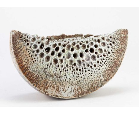 † ALAN WALLWORK (1931-2019); a narrow stoneware wedge form with impressed decoration partially picked out in green glaze with