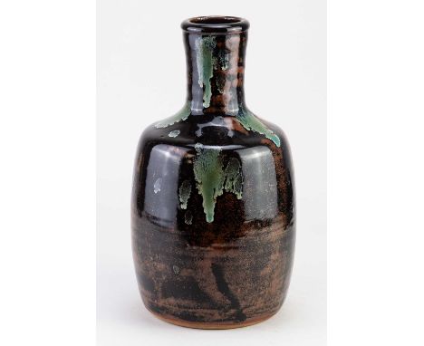 † JIM MALONE (born 1946); a stoneware bottle covered in tenmoku breaking to kaki glaze with copper green pours, impressed JM 