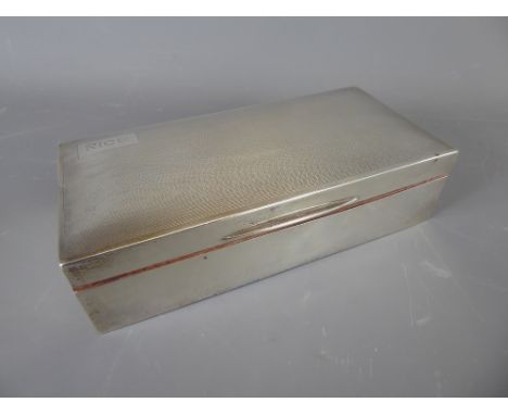 A Silver Double Cigarette Box, Birmingham hallmark, dated 1937, mm S.Blackensee & Son, Ltd, engine turned top with cedar-wood