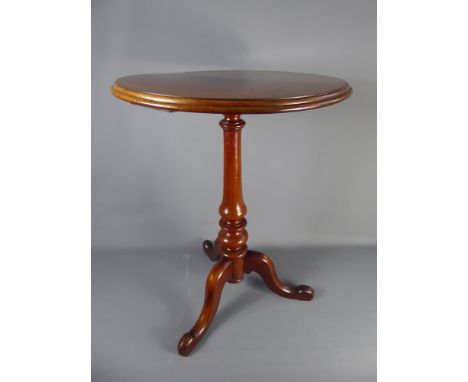 A Mahogany Wine Table, turned column on tripod base, approx 59 x 78 cms.