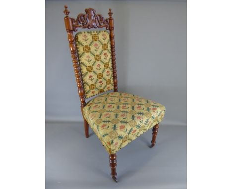 A 19th Century Victorian Walnut Cloister Chair, floral tapestry upholstery , approx 51 x 103 x 50 cms.