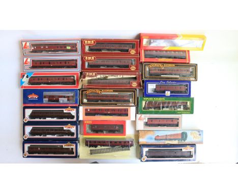 Twenty two boxed OO gauge mostly BR maroon railway coaches from Hornby, Lima, Mainline, Airfix, Bachmann and Hachette includi