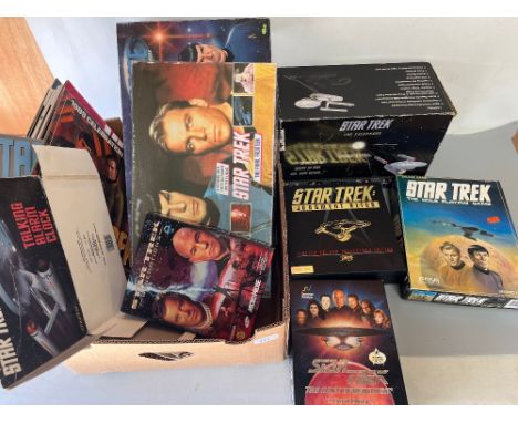 Telemania telephone in the form of the Star Trek USS Enterprise, and other Star Trek merchandise incl. calendars, board games