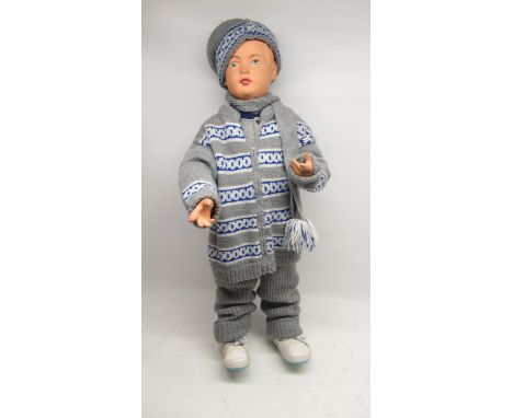 20th Century papier mache child shop mannequin, adjustable arms with painted features, H82cmShipping POA https://www.bradleys