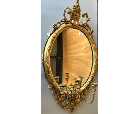 19th century  giltwood and gesso girandole oval wall mirror, H95cmShipping POA https://www.bradleys.ltd/quotation-request-for
