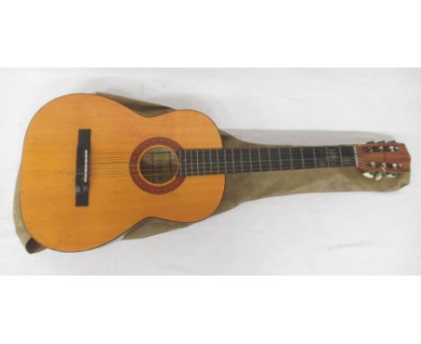 Tatra Classic 6 string acoustic guitar with carry bag and Herald Model MG104N 6 string acoustic guitar on standShipping £88.0