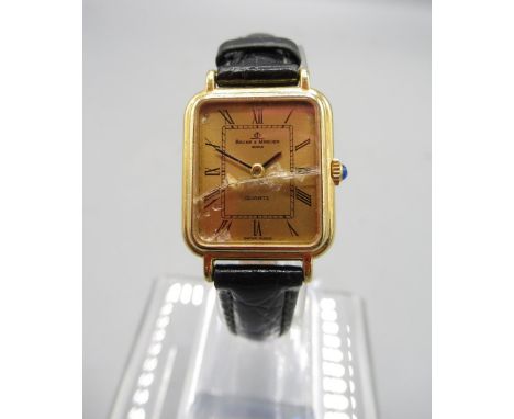Baume Mercier ladies 18ct gold quartz wristwatch on replacement leather strap with signed gold plated buckle, signed gold col