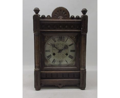 Maurer Pfaff & Maier, beech mantle clock, carved case with bevel edged glazed door enclosing 6 3/4" brass and silvered chapte