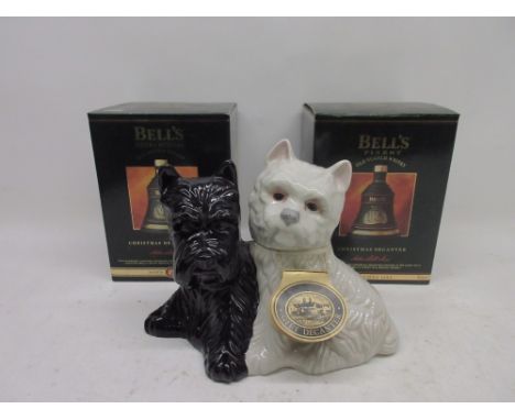 Two Bell's Old Scotch Whiskey Christmas decanters, 1993 & 1994, containing whiskey 70cl, Black & White premium 12 year old de
