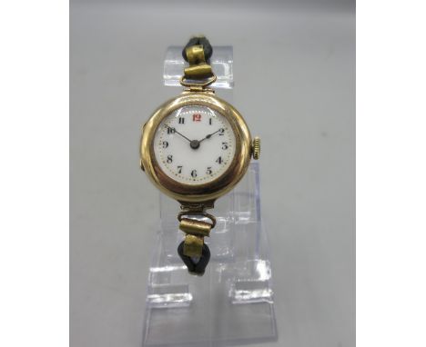 Swiss ladies trench style 9ct rose gold wristwatch with hinged lugs on cord and leather strap, white enamel Arabic dial with 
