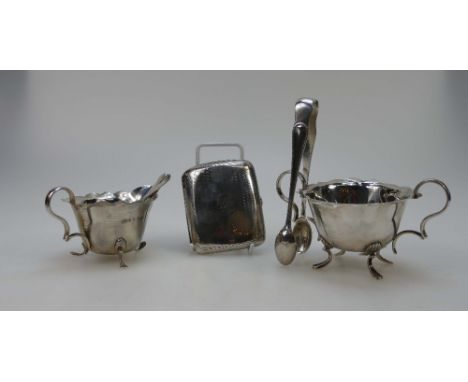 A collection of hall marked silver items including two handled sugar and cream jug,spoons & tongues and cigarette case (398g)