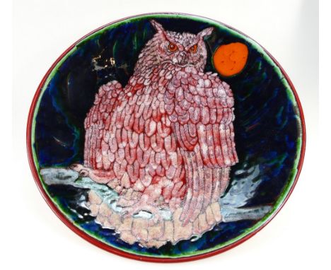Large Poole Studio plaque initialed T.M to rear, decorated with owl under moonlight, 41cm diameter.