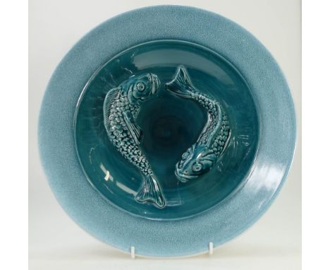 Poole Pottery hand thrown large bowl in two tone blue glaze, the inside modeled with two fish, diameter 34cm.