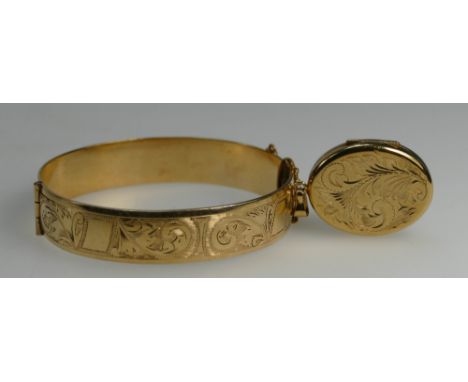 9ct gold locket (7.4g) and rolled gold bangle (2)
