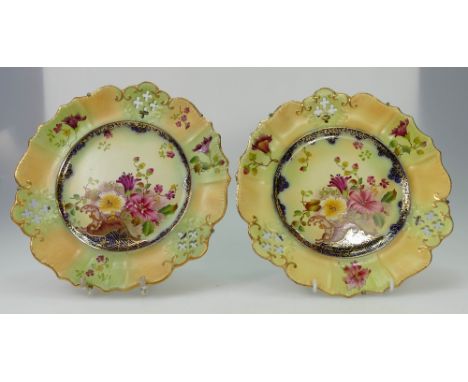 Pair Carltonware shaped ribbon plates gilded and decorated with flowers, diameter 24cm  (2)