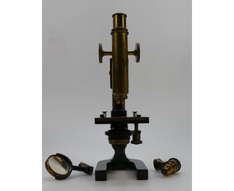 Clarkson & Co 20th century Microscope, brass and cast iron in construction, complete with objectives and attachments