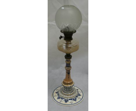 19th Century pottery oil lamp with brass fittings and glass bowl and etched glass shade, overall height 84cm.