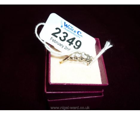 A 9ct gold and five diamond Ring, boxed.