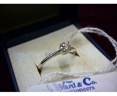 An 18ct white gold 1/4 carat diamond solitaire Ring.