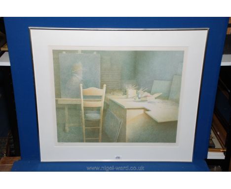 A large framed limited edition Print of an artist's studio, no. 90/225, signed in pencil lower right