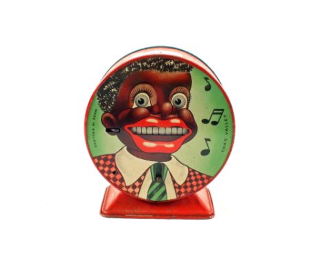 A Chad Valley tin plate ethnic boy money box