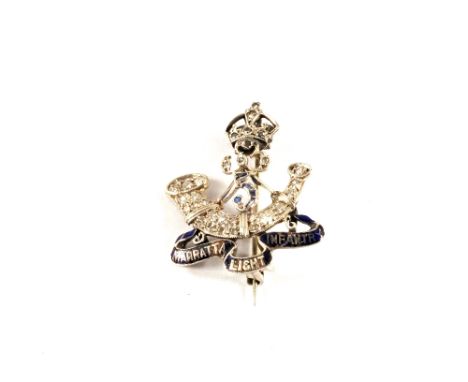 A White Gold Diamond encrusted Light Infantry sweetheart brooch with Sapphire number 5 set in centre and blue enamelled Moto 