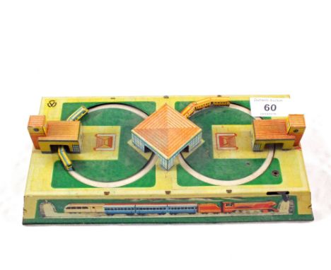 A tin plate miniature railway automaton 
