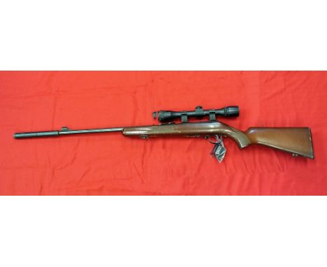 A .22 RF bolt action rifle by Anschutz complete with two x 5 round magazines and A.S.I. 4x32 scope, Serial No. 1288388, this 