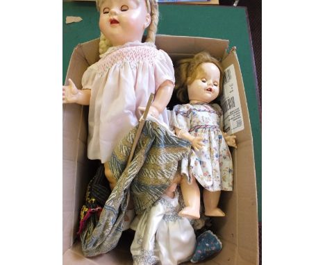 Two 1950's vinyl dolls, various costume dolls and a Javanese puppet