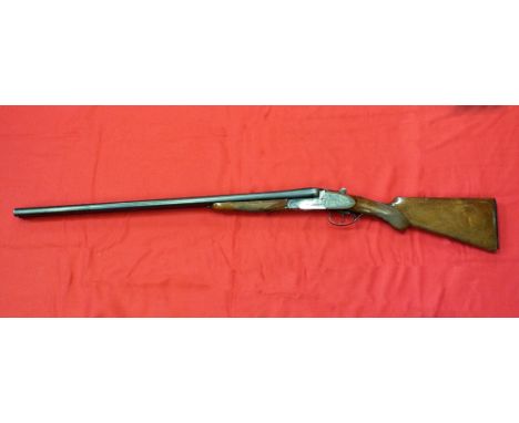 A 12 bore S/S S.L.N.E. shotgun by Zabala, made for 'Loufou-Leau Guns of London' with 28" barrels, this item can only be purch