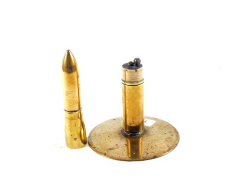 A large brass 'Trench Art' lighter