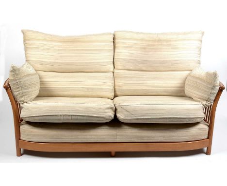 Ercol: an elm ‘Renaissance’ sofa, 190 x 102 x 100cms high.