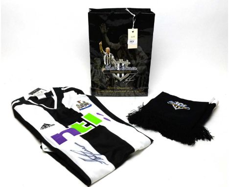 An Alan Shearer autographed Testimonial football shirt, and Newcastle united scarf.