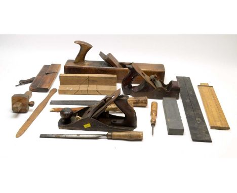 A selection of wood working tools, including: wood planes, rules and other items, by makers including Hearnshaw Bros, and oth