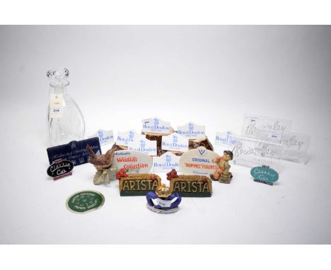 A selection of ceramic and other advertising signs, including: three Brierley Crystal advertising plaques; eight Royal Doulto