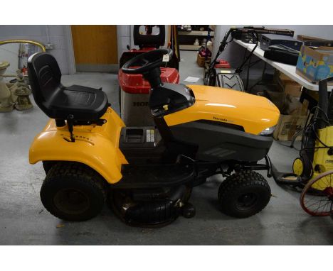 A Stiga Tornado 2098 ride-on lawnmower, in yellow, with manual. 