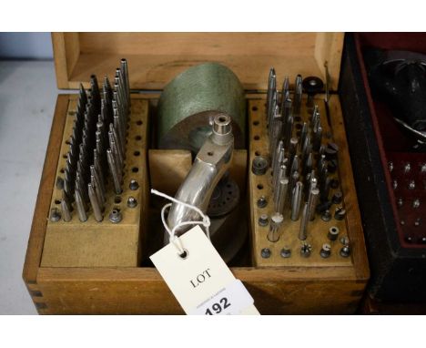 A Swiss Seitz watchmakers staking tool or jewel press, in box; together with another; and an assortment of other cased watchm