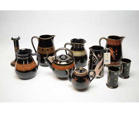 A small collection of Ridgway 'Jetware', including a Greek revival pattern jug no. 4189; a similar jug with anthemion band; t