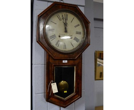 An American rosewood drop dial wall clock, c1900, the painted roman dial with the retailers mark of M Young &amp; Sons, Newca
