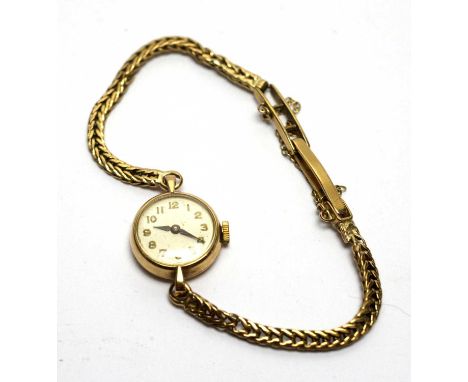 A 9ct yellow gold cocktail watch, with arabic dial and manual wind movement, 10.3g gross. 