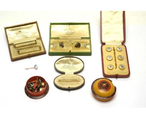 A 9ct yellow gold tie pin, 1.8g; a set of mother-of-pearl and gilt metal button pattern shirt studs, cased; a selection of ot