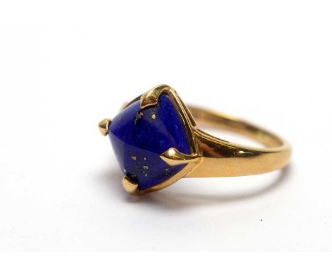 A lapis lazuli ring, the lapis square cabochon in 9ct yellow gold mount and shank, ring size P, 3.1g gross. 