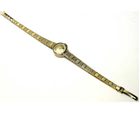 A 9ct white gold Rotary cocktail watch, the baton dial fitted manual wind movement, on link strap, 17.3g gross, boxed. 