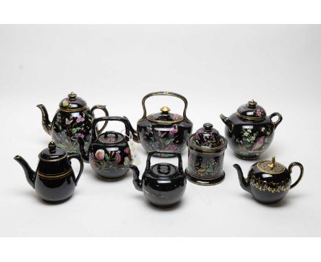A selection of 19th Century Ridgway Jetware, comprising: tea kettle and cover, with colourful floral decoration; a sucrier an