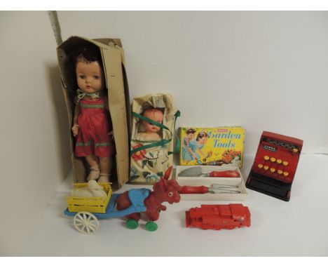 A Merit boxed Garden Tools, trowel and fork, c.1951; a Codeg Cash Register; a hollow plastic pony, cart and #"squeaking" duck