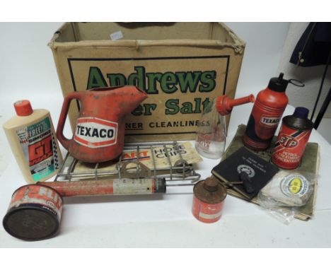 A Lucas battery filler bottle with original red plastic top together with plastic Texaco oil can; Unipart Hose Clip fitting a