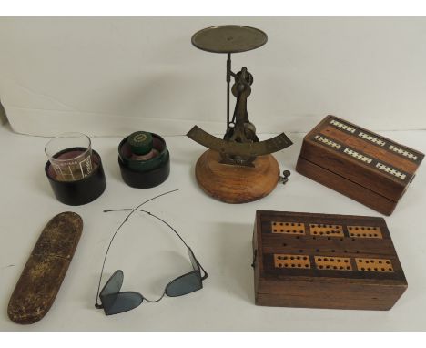 Two wood card boxes with inlaid cribbage boards to outside; a small brass balance scale on wood base; a pair of 19th Century 