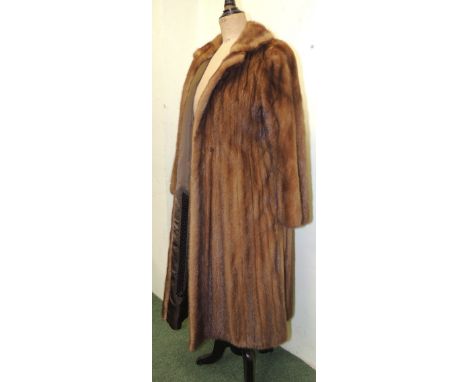 A long mink fur coat labelled "Davidson's Chestnut Natural Mink" with initialled and embroidered lining ++good condition