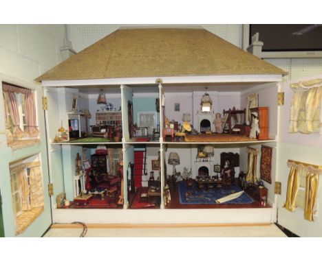 A LARGE DOLLS HOUSE REPLICA OF THE LITTLE WHITE COTTAGE, FALMOUTH home to Howard and Marion Spring - worked to a scale of one